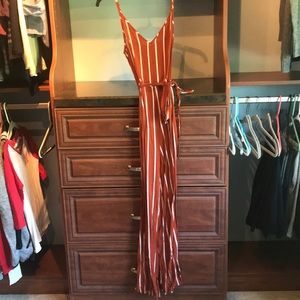 Orange and white striped jumpsuit with tie